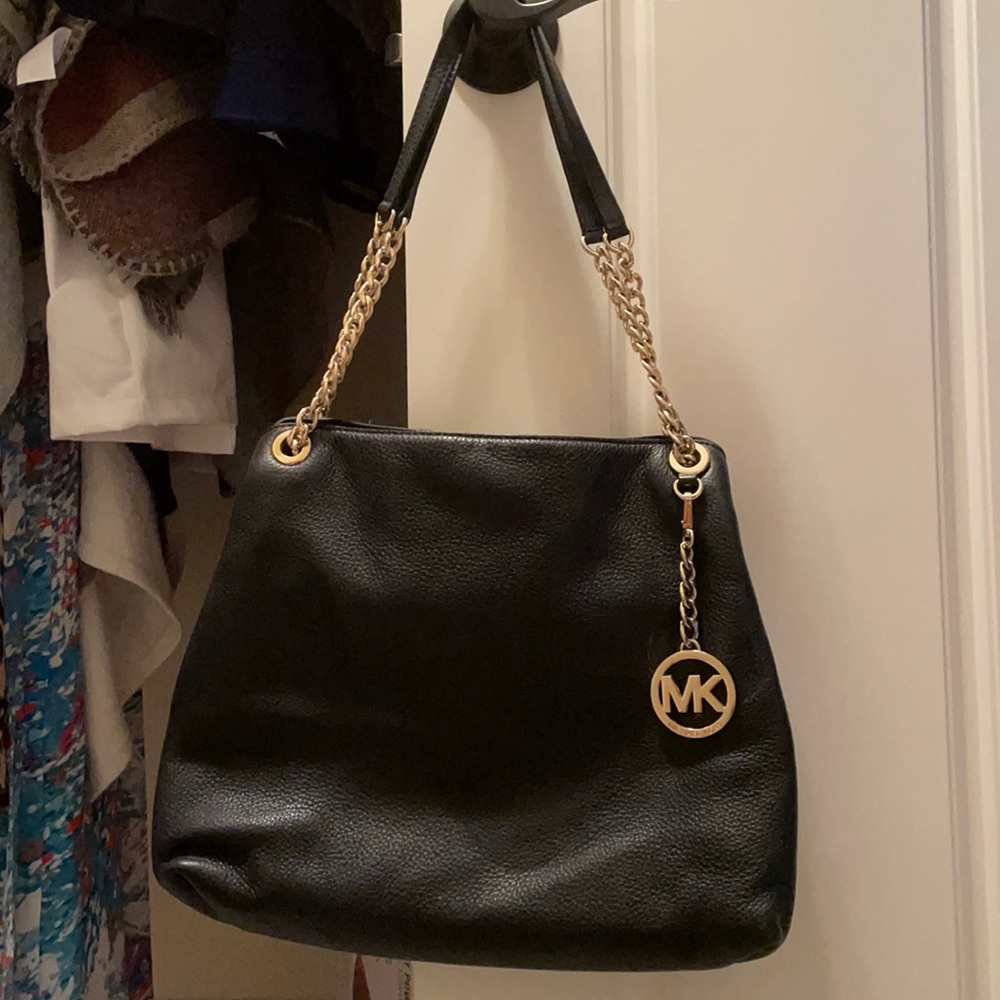 Black and gold Michael Kors purse